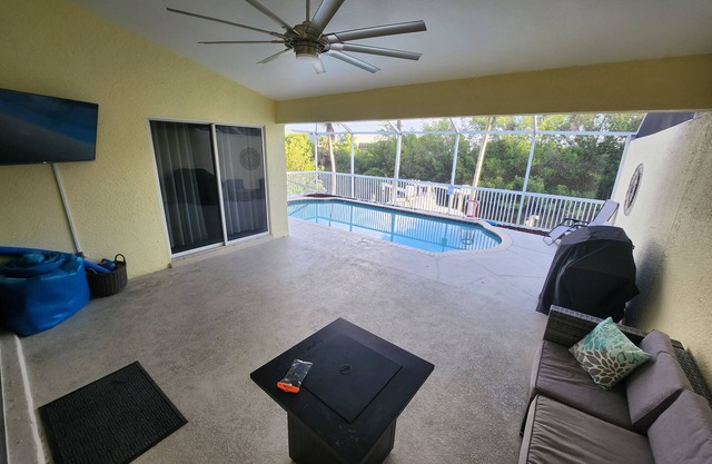 Completely renovated home with private heated pool, on gulf access canal