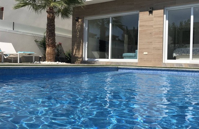 Contemporary new villa with private swimming pool and close to beaches