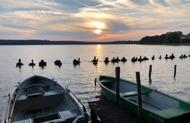 Cottage on the lake with lake view with boat