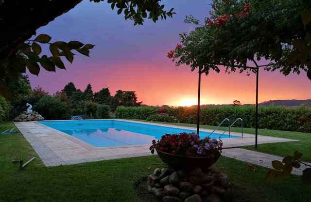 Country house with pool and garden.