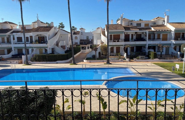 Cozy Bungalow with terrace overlooking swimming pool.
