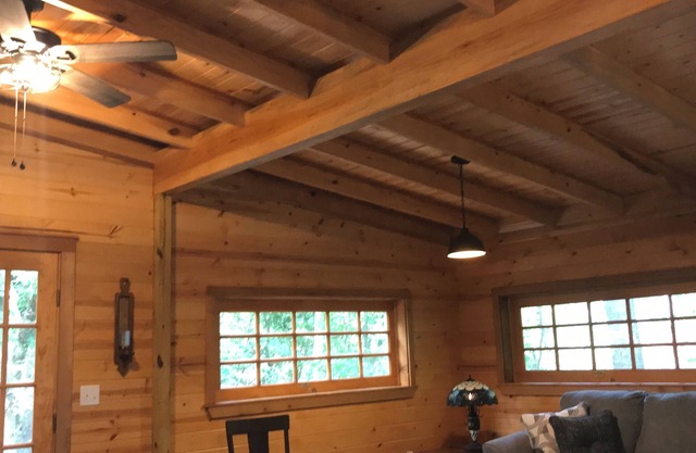 Cozy cabin in secluded forest with deck on creek. Full kitchen. 900 square feet.