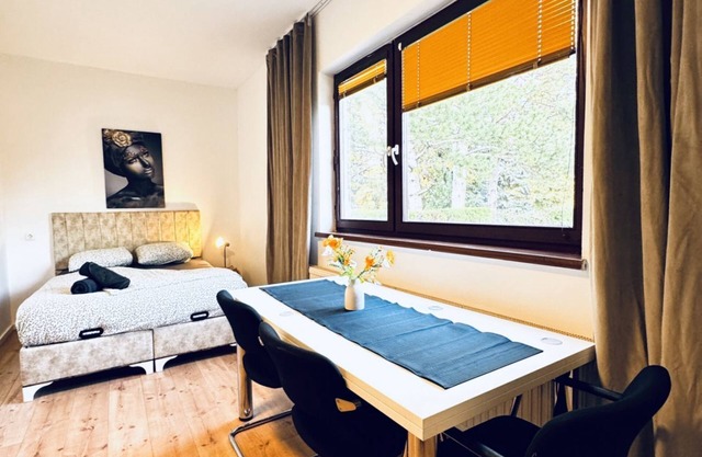 Cozy Central 8BR Apt w/Garden & Terrace, Up to 24P