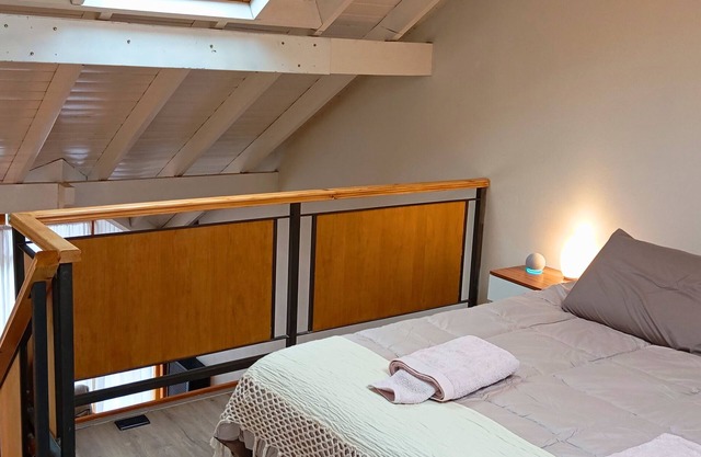 Cozy Downtown Loft with Rustic Style