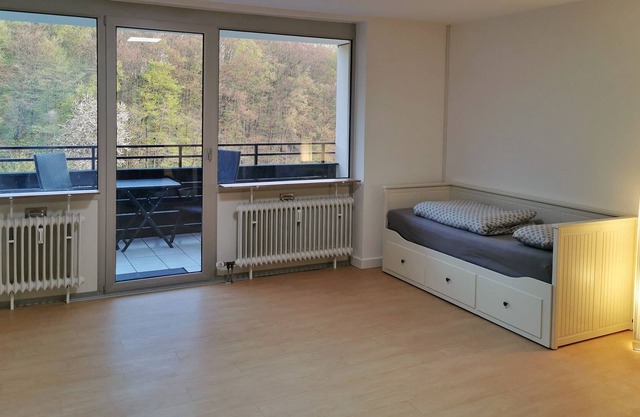 Cozy holiday apartment with a view of the forest and a balcony in Gießen-Buseck