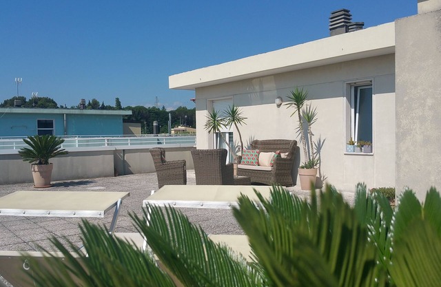 Cristina’s flat, a cozy attic with roof garden next to the beach