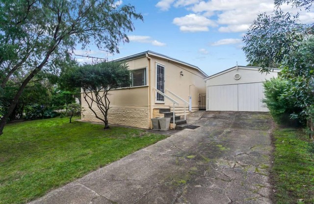 Cute As A Button Beach Cottage