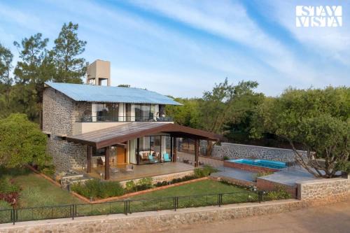 Dawn Ecstasy by StayVista - Hill-view villa with Modern interiors, Garden area & Indoor games