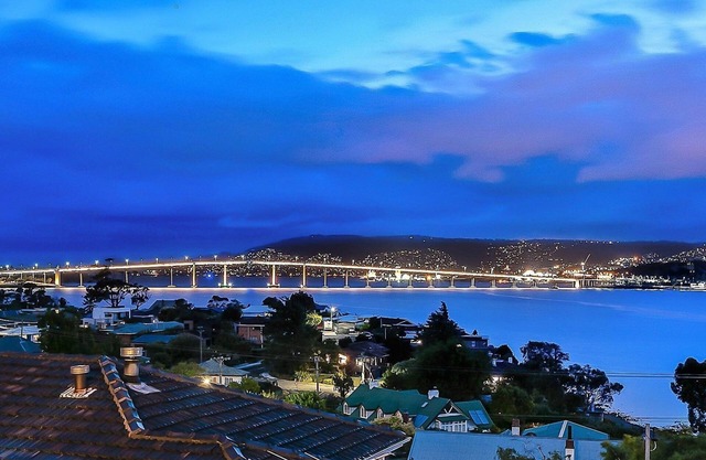 Deep Blue Wow views over river city mountain