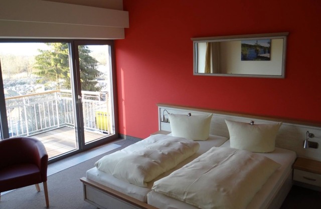 Deluxe double room with balcony - Hotel & Restaurant Am Peenetal