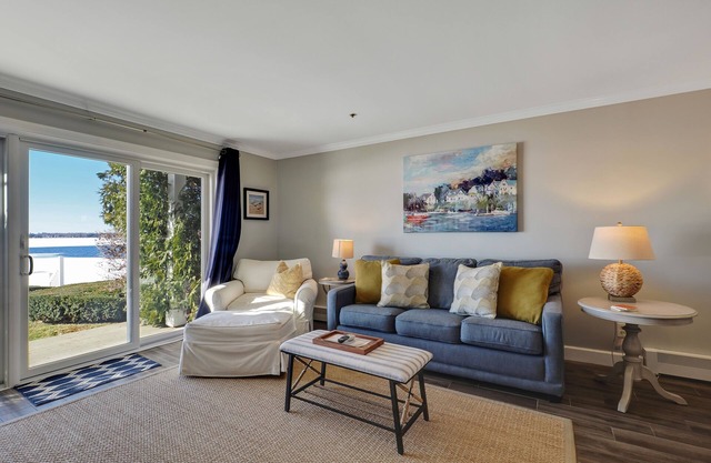 Direct Lake Charlevoix Access | First Floor Beach Retreat | Private Patio |