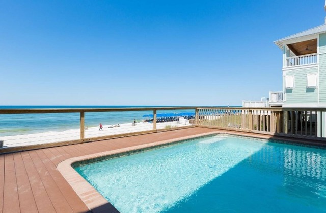 Directly on the Beach, 6 bedroom Beach House with Heated Pool and Hot tub.