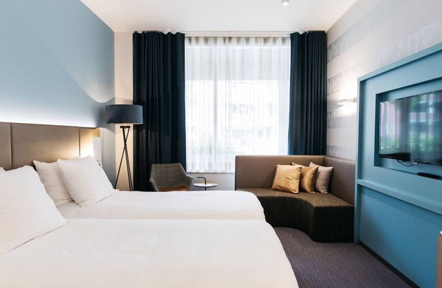 Discover Dutch Hospitality in the Heart of Weert! Onsite Dining and Parking!