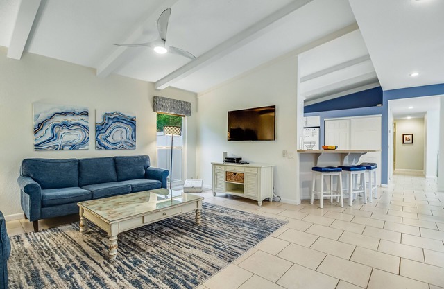 Dog-friendly house w/private heated pool & entertainment - walk to the beach