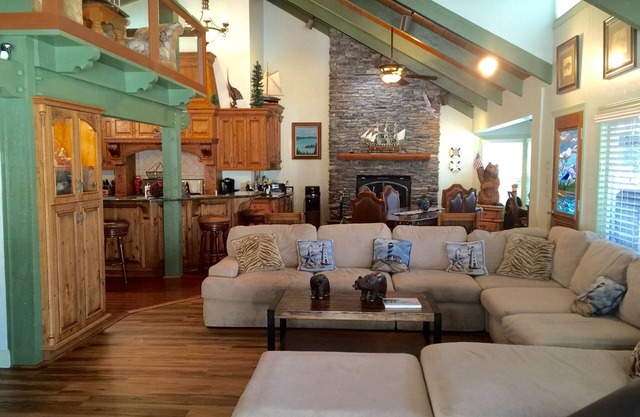 Dog-friendly, lake view home with a boat slip, three decks, & WiFi