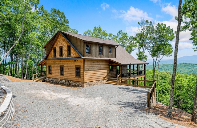 Dog-friendly, mountain-view cabin with hot tub, fireplaces, firepit, game room