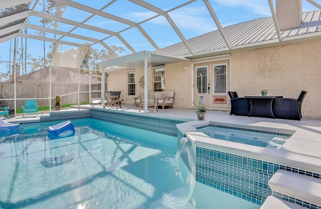 Dog-friendly, single-story home with private pool, lanai & great yard