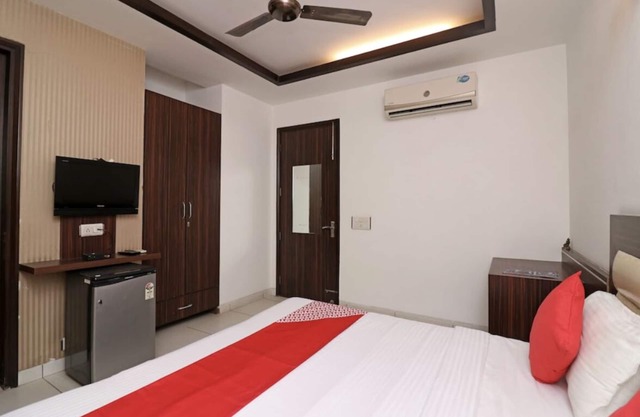 Double Deluxe Room @ Sterling Hotel Rooms With Balcony Near Dlf Ambience Mall