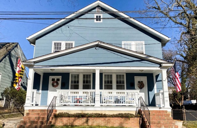Double-sided Navy-themed Home with Hot Tubs and Parking at Pet Friendly, Private Fenced-In Backyard