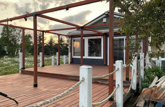 Drift into comfort at the Cozy Current. Your lakeside escape awaits you!