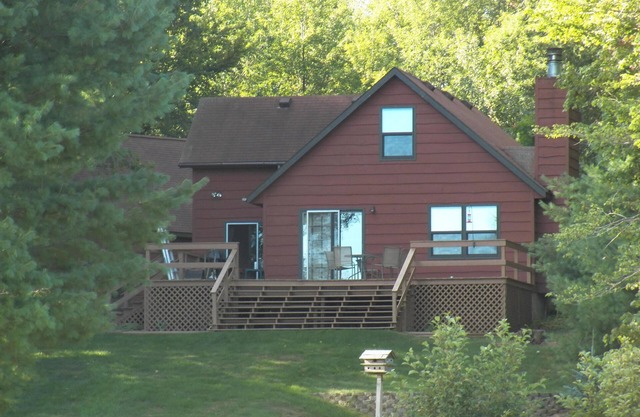 Duneview Lake House on a private and peaceful setting on Hamlin Lake