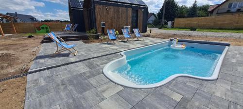 Dwa Wymiary - Całoroczny domek z Jacuzzi i basenem podgrzewany w okresie wiosna - lato w cenie