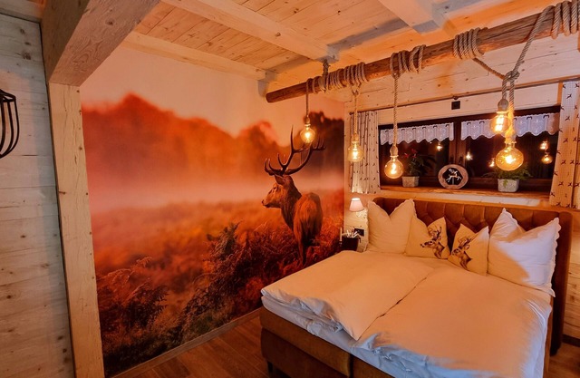 Edelweiss romantic suite with fireplace & Swiss stone pine sauna