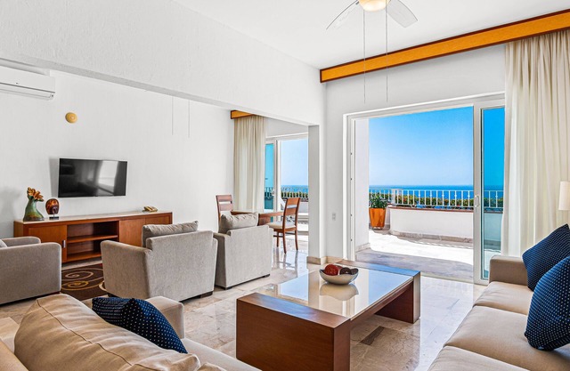 Elegant oceanview suite with heated pool, private hot tub & terrace dining