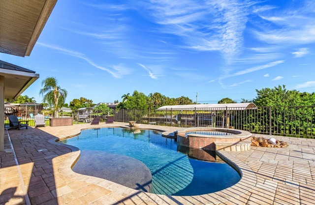 Enchanting 3-Bedroom Waterfront Pool and Spa Home