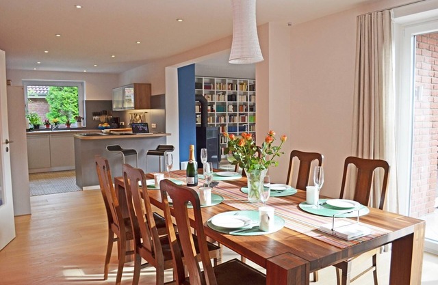 Enjoy your relaxing vacation in our ultra-modern bungalow "Schleiglanz" with high-quality furnishings and wood-burning stove, only 300 meters from the Schlei in a quiet location on the edge of the forest