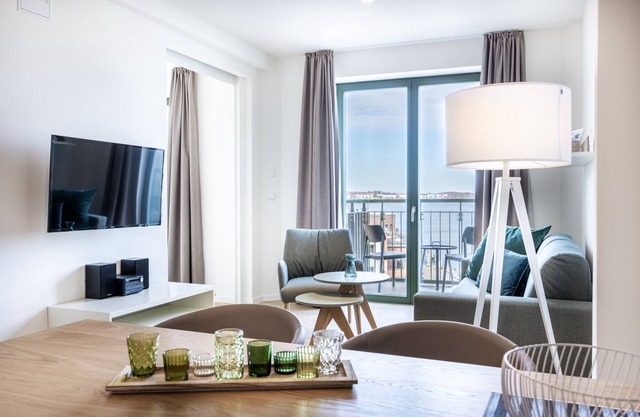 Erstklassiges Hafen-apartment mit Balkon, Saunanutzung und Großartigem Ausblick!