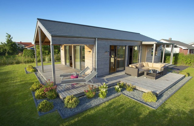 Exclusive design holiday home made of healthy natural materials with top equipment