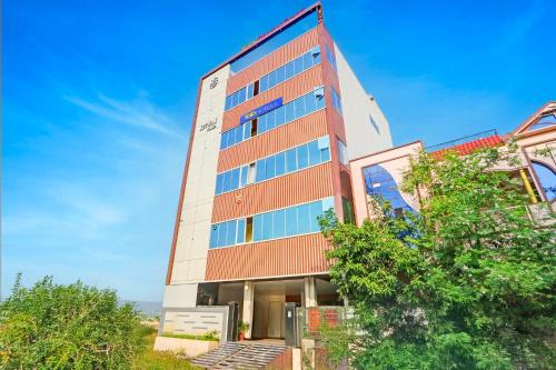 FabHotel Dharani Grand - Nr Mamata Medical College