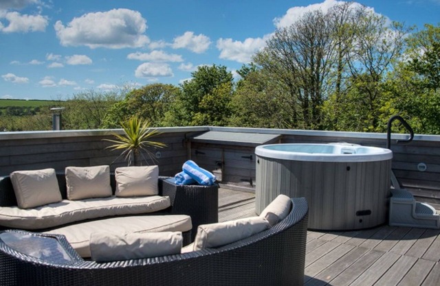 Fabulous property with extensive roof terrace, reached by a spiral staircase, affords panoramic view