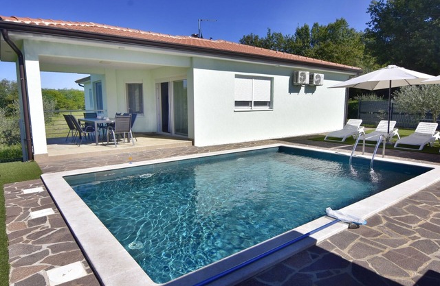 Family friendly house with a swimming pool Buroli, Umag (K-22400)