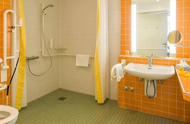 Family room with shower and toilet