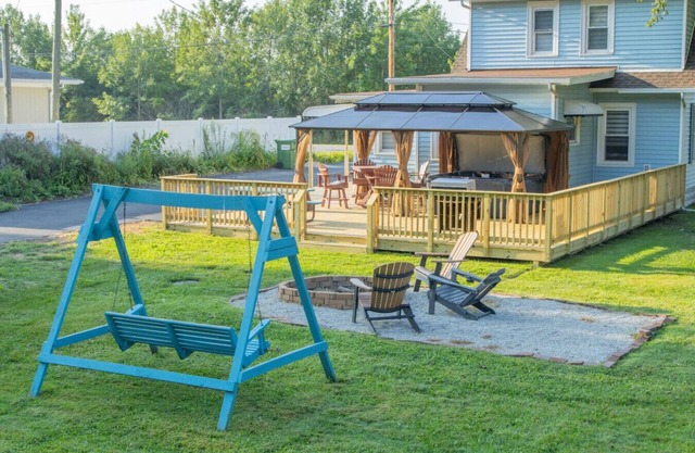 farmhouse/hot tub by Camp Perry