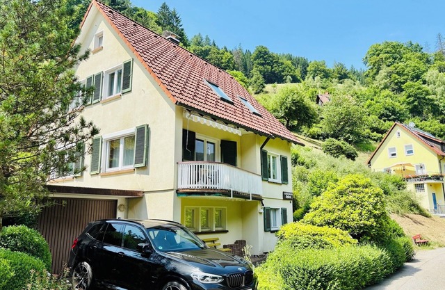 Ferienhaus Oesterle - Idyllic Black Forest house by a stream with terrace & balcony