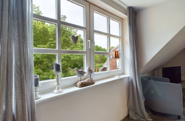 Ferienwohnung Südstrandperle - Ferienwohnung Südstrandperle mit Großartigem Gartensitzplatz