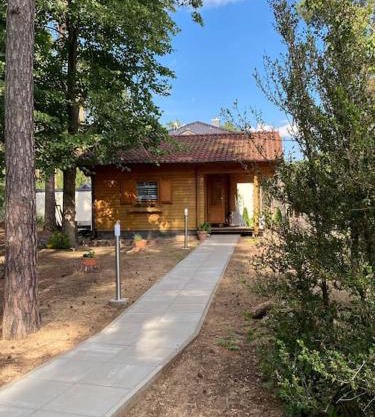 FEWO PARTNERS Haus Clemens - Gemütliches Holzhaus mit Grundstück nahe Badesee