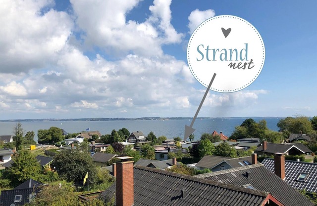 fewo1846 - StrandNest - House with view of the fjord, fireplace, sauna and 3 bed