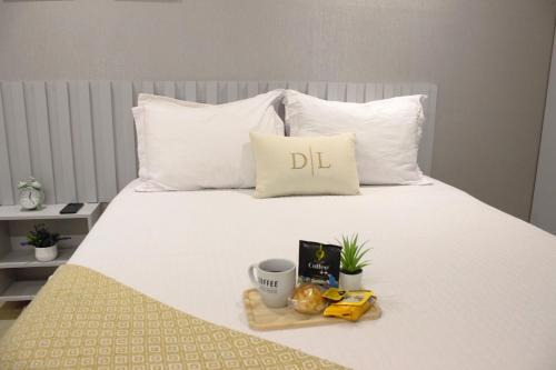 Flat aconchegante - Perto de Tudo - Vista Livre - Estacionamento privativo e Portaria 24h - Wi-Fi 600mbps