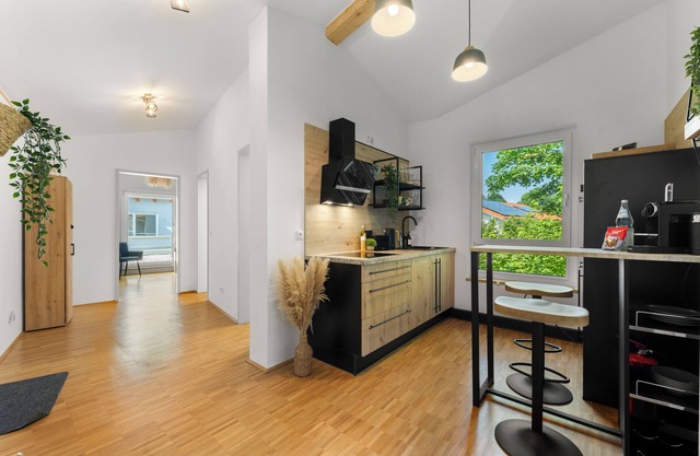 Flussperle Miesbach | Dream vacation apartment with river view and roof terrace