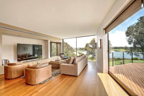 Front Row Golf & Lake Views Luxe Coastal Retreat
