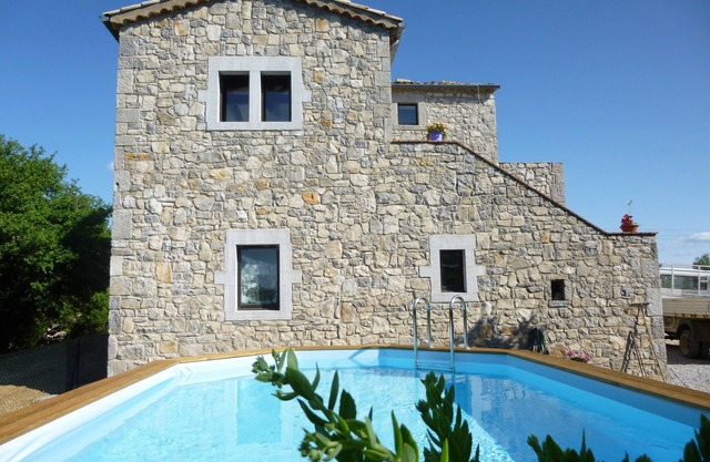 Fully air-conditioned stone villa with panoramic views and private pool.