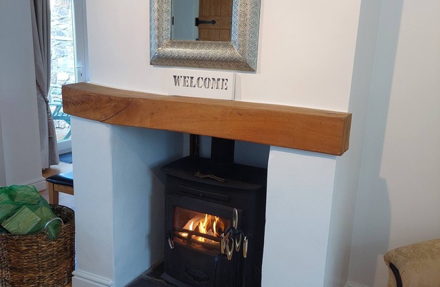 Gadlys cottage sleeps 6 dog friendly walk to Church Bay Beach sea views