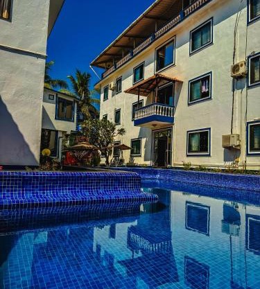 GOAROUND - Honeydew Suites at Vagator by Goaround Homes