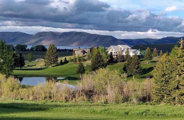 Golf Course Lakehouse with fantastic views of the lake, mountains & golf course.