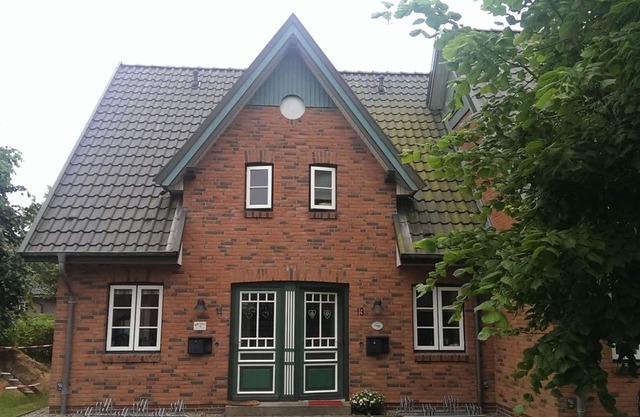 Green Eilun 13 - Modernes Reihenhaus mit Garten, Spielecke, Waldzugang und Nähe zum Südstrand