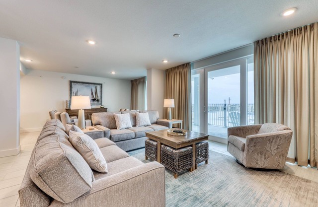Gulf-front condo with pools and seasonal beach service in a gated community